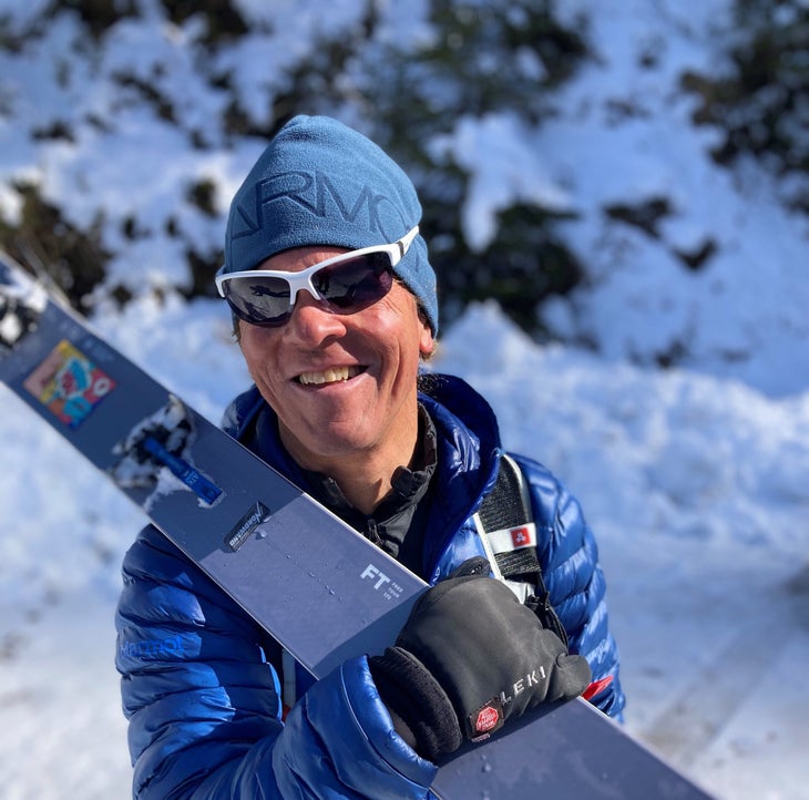 Luis Stitzinger with skis