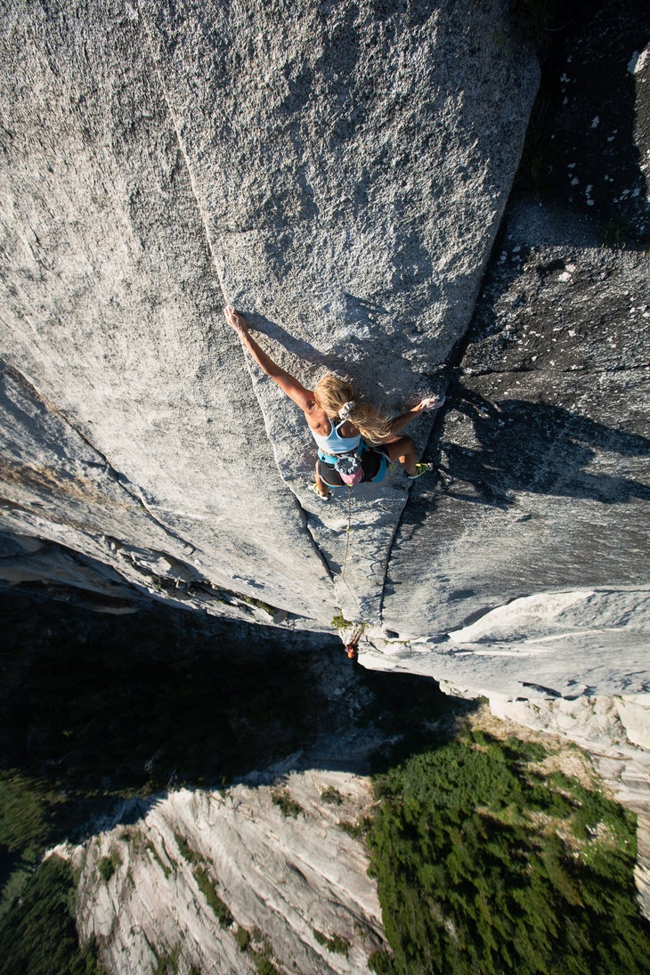 Brette Harrington climbs steep cracks on pitch 7 of Hidden Dragon on the Chinese Puzzle Wall, British Columbia.