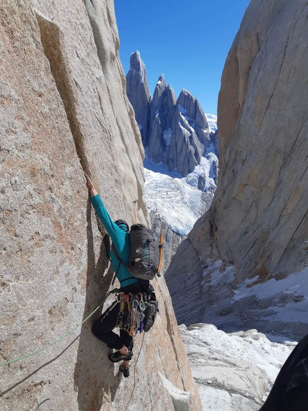 Ripley Boulianne on the first pitch of their new route on the 600-meter North Face of Aguja Poincenot, in Patagonia.