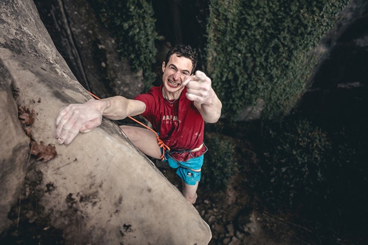 Adam Ondra celebrates with his final Sloper Jug at Bon Voyage.