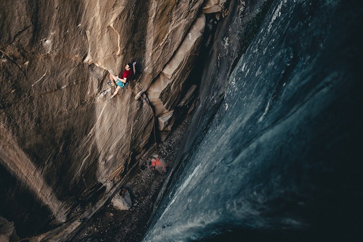 Adam Ondra climbing Bon Voyage. This shot is top down and shows the starting section of the route before the crux traverse.