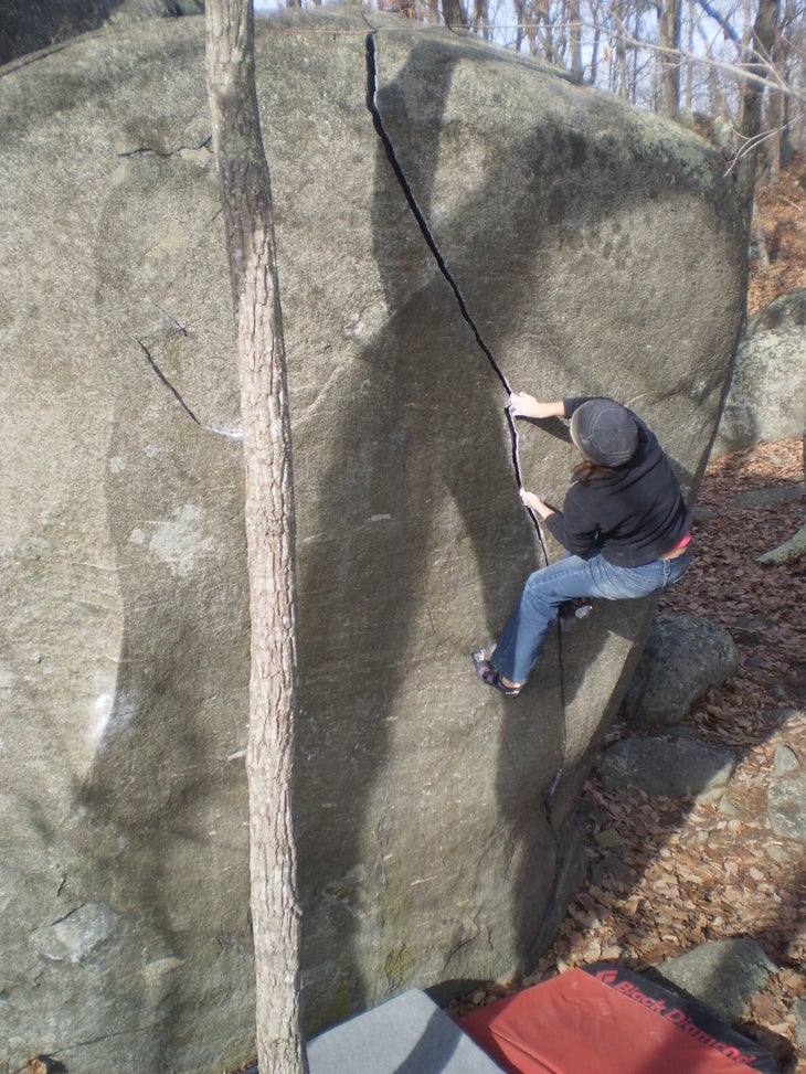 A climber on one of Asheboro's classic climbs: Lightning Crack