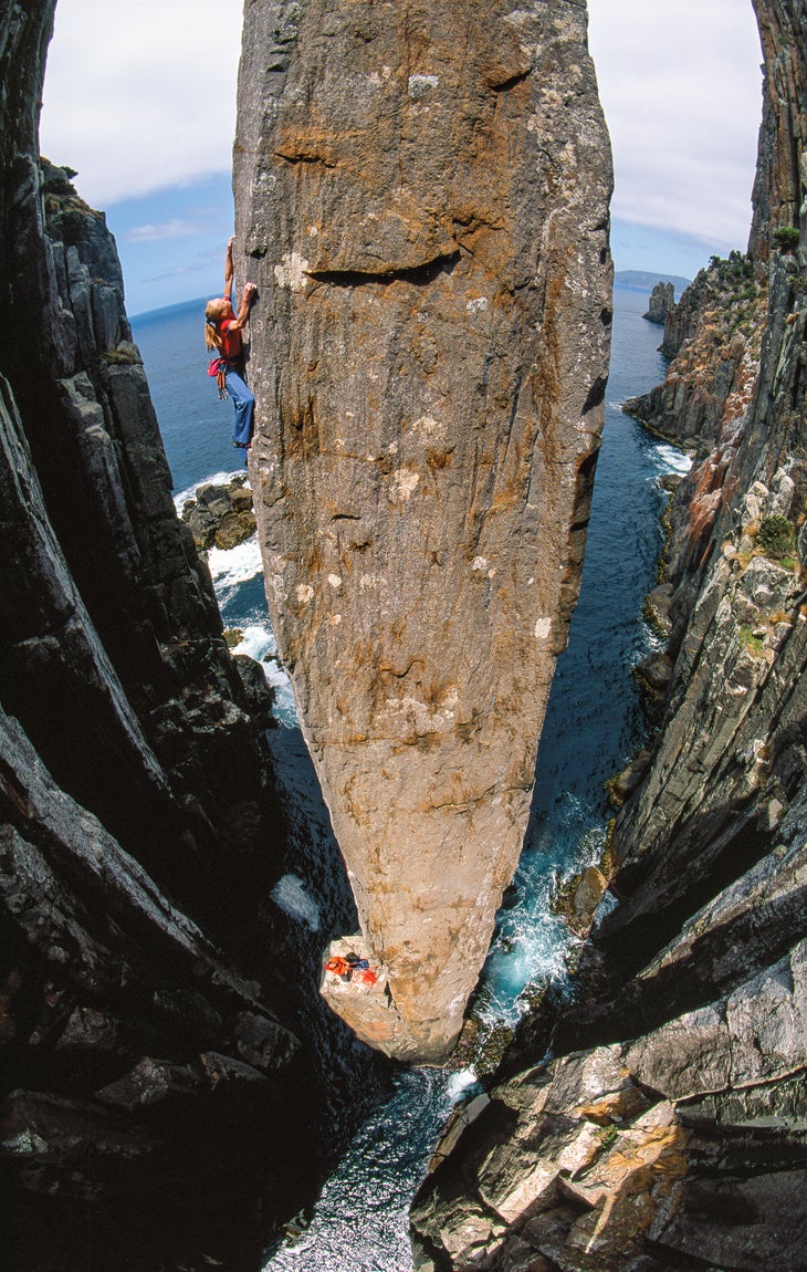 Monique Forestier leading pitch two of the Free Route (25/5.11d) on the Totem Pole: an extraordinary 65-meter dolerite column at Cape Hauy, Tasmania, Australia.