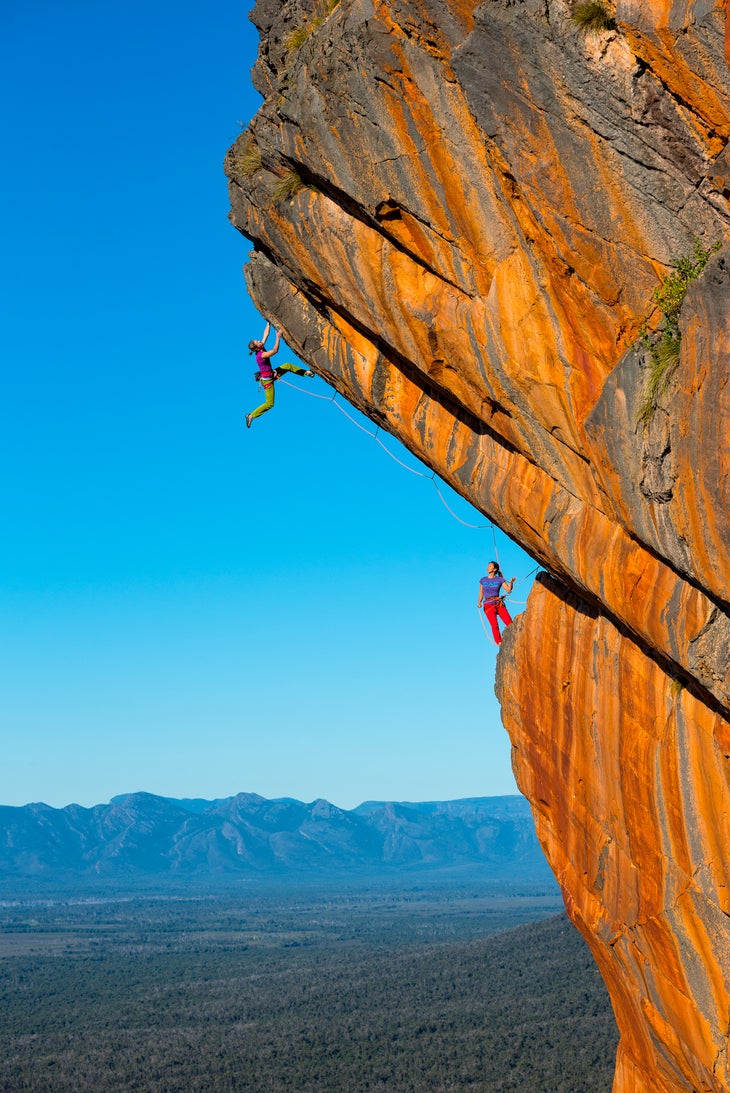 Ashlee Hendy (leading) and Elizabeth Chong on pitch two of The Man Who Sold the World (25/5.11d), Grampians, Victoria, Australia.