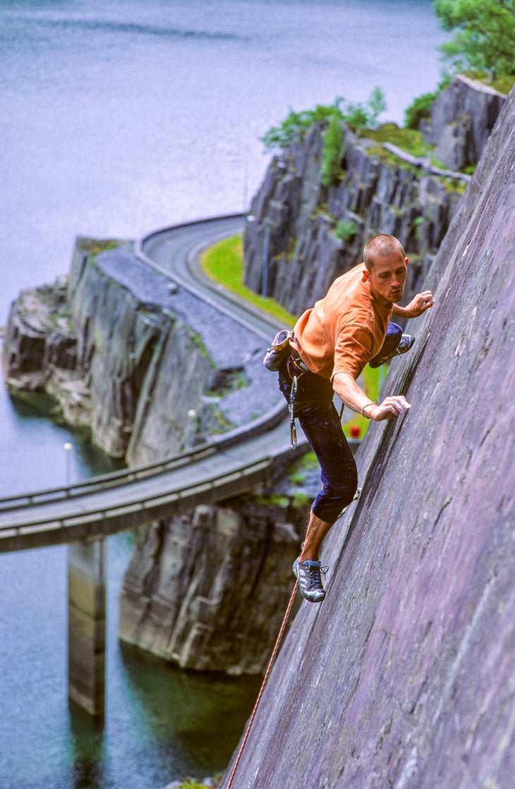 Steve McClure balances up The Very Big and the Very Small (8c/5.14b), Rainbow Slab, Llanberis Slate Quarries, Wales, UK.