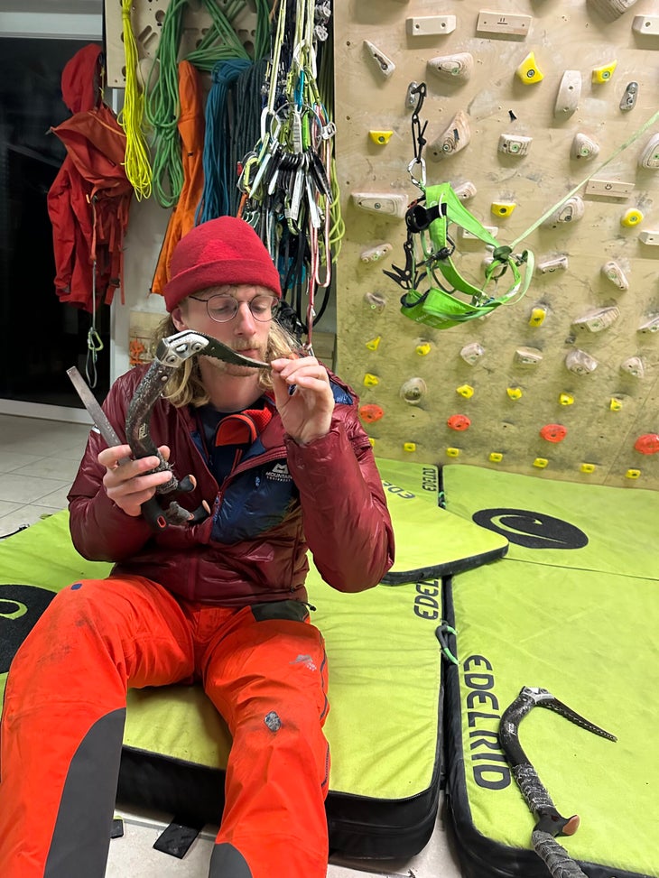 Climber Martin Feistl prepares climbing gear in his home.