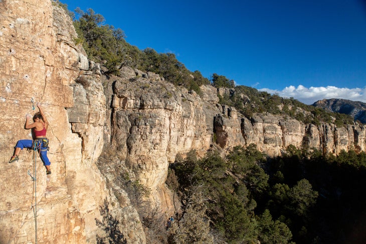 A woman climbs a route in Shelf Road, Colorado