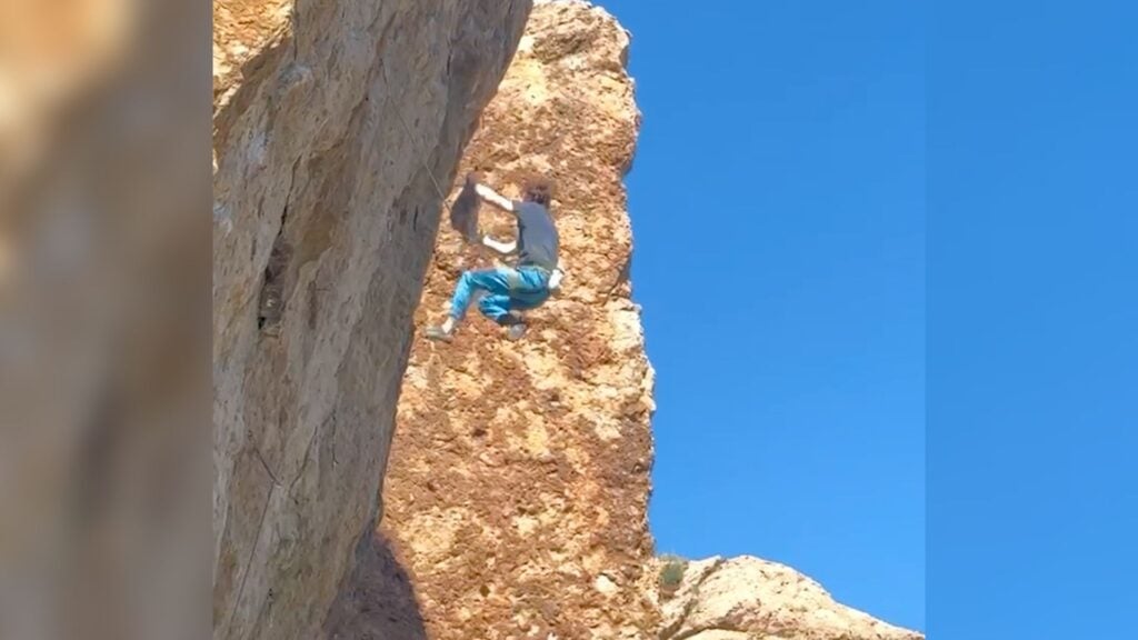 Climber Pulls Loose Rock From Cliff, Narrowly Avoids Accident - Climbing