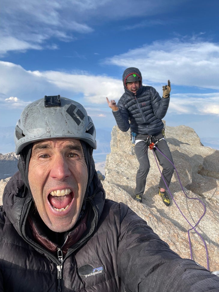 Puhvel and Leary screaming with joy on the summit of the Keeler Needle.