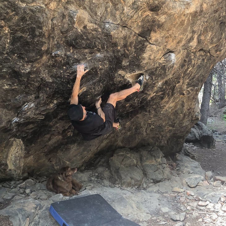 Matt Samet climbs steeply overhung outdoor boulder problem.