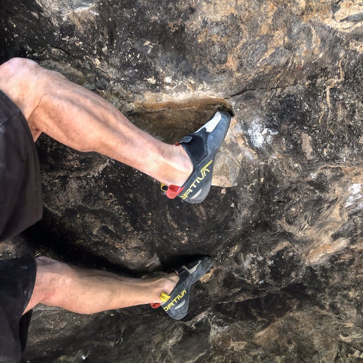 Climbing overhanging rock in the La Sportiva Mandala.