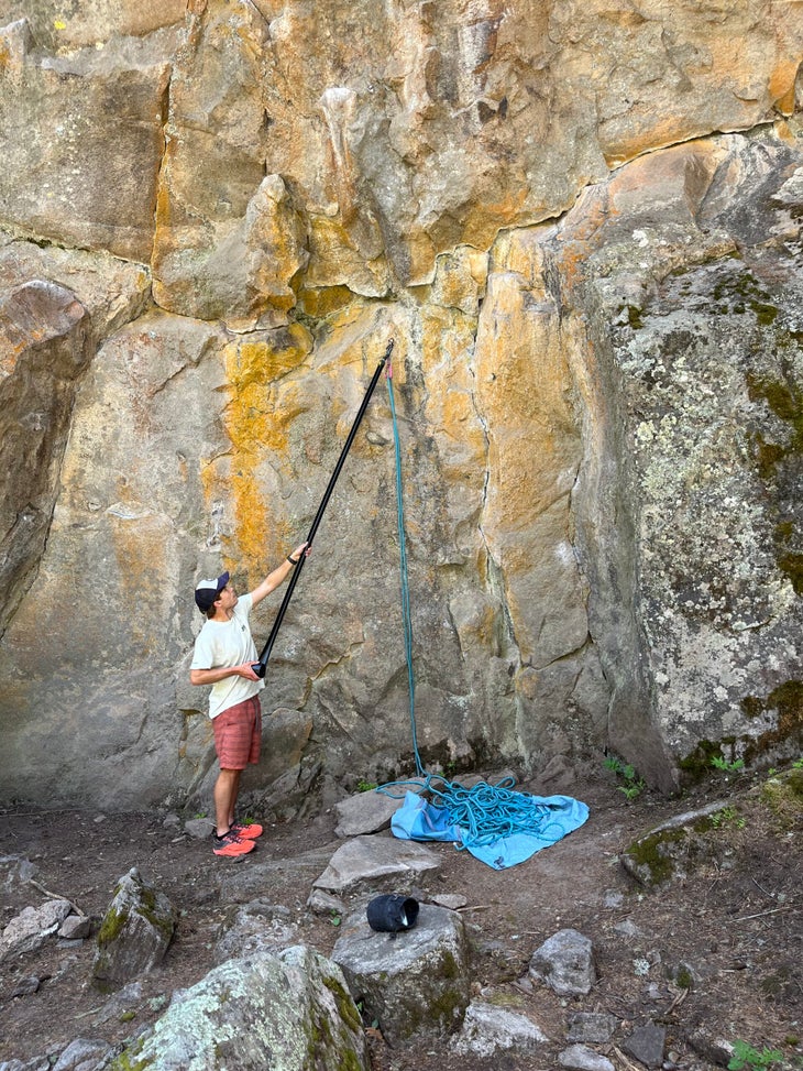 The author demonstrating how to use Metolius's Roll Up Stick Clip clip.