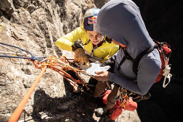 DiGiulian studying a topo map on El Gigante, in Mexico, with climbing partner Vian Charbonneau