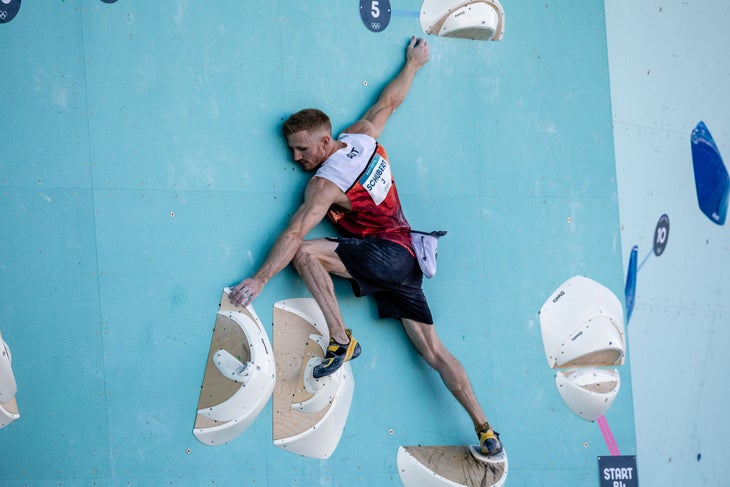 Jakob Schubert balancing on a slab in the Olympics.