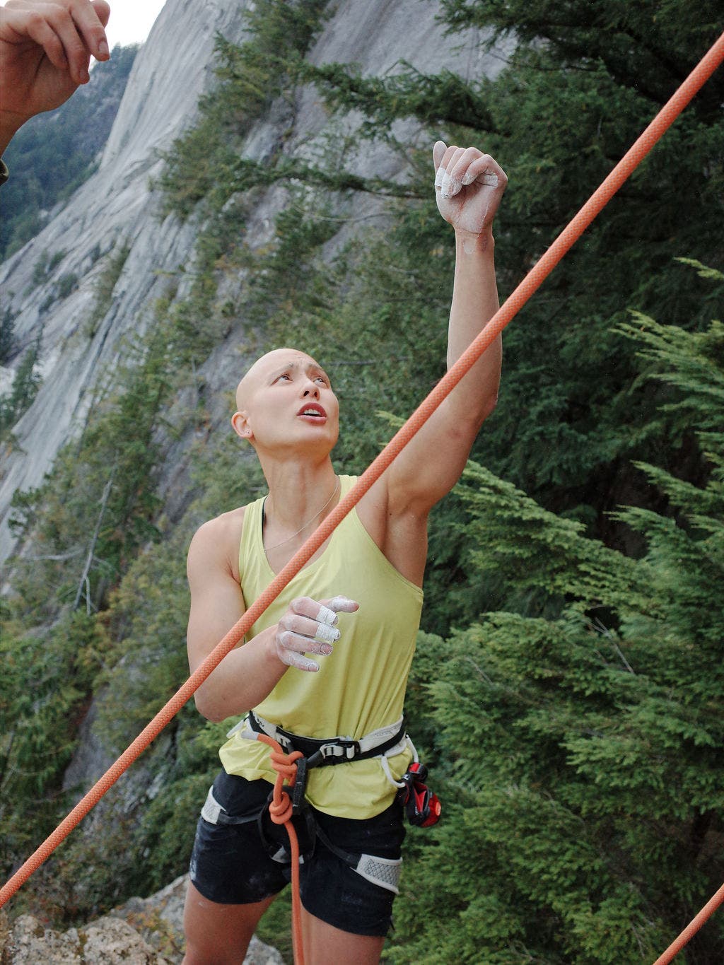 Alannah Yip practices the moves of a sport climb on the Chief, Squamish.