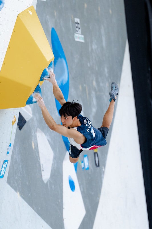 Chon Yejun of Korea competes in the Boulder semi-final during the IFSC World Cup in Innsbruck (AUT).