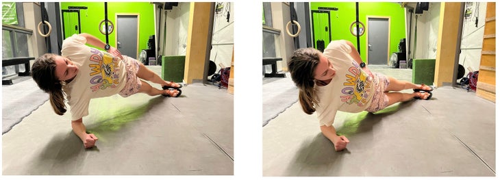 Woman performs a side plank in gymnasium.