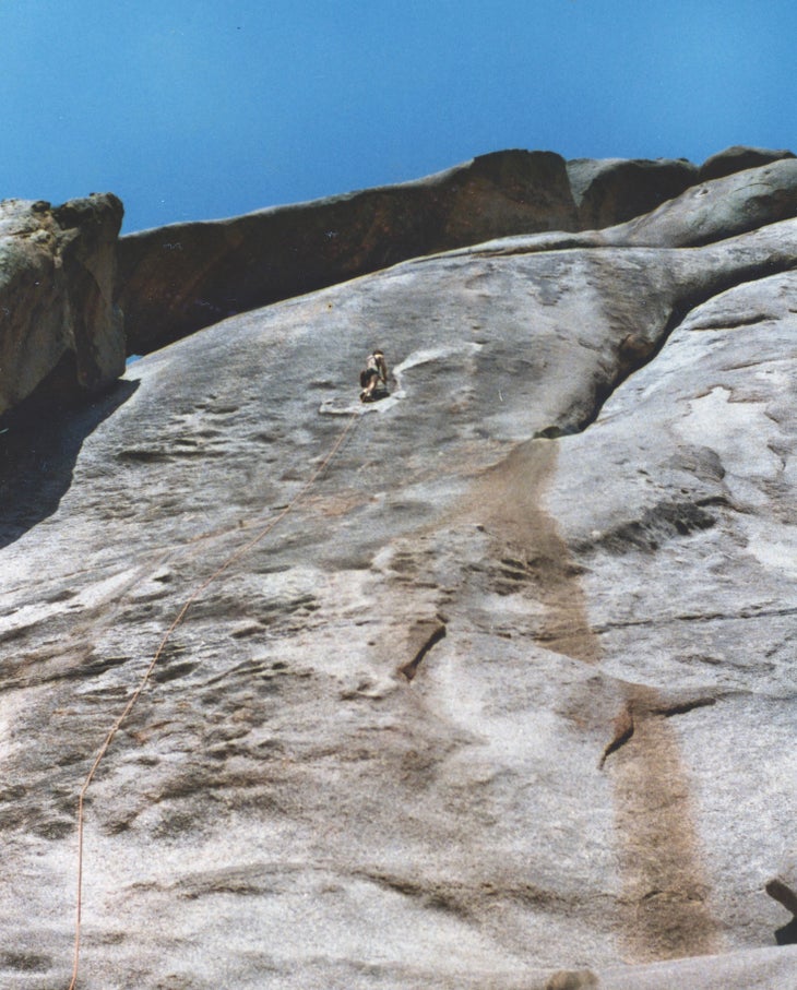 Bill Thomas at the “S” during the first ascent of The S Wall at Quartz Mountain in 1979, an area rife with climbing tragedies.
