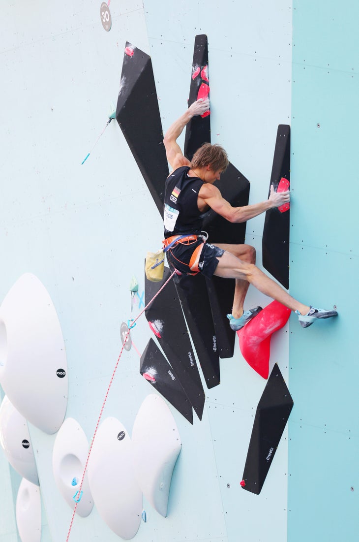 Alex Megos on a hard gaston move on the Men's Olympic semifinal.