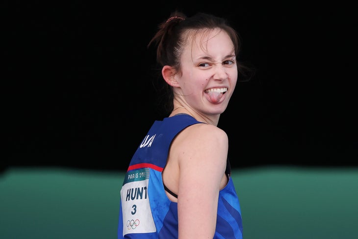 Emma Hunt sticking her tongue out at the audience after falling.