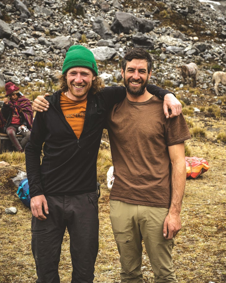 Quentin Roberts and Alik Berg smile in basecamp after climbing Reino Hongo.