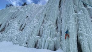 An ice climber on a sheet of ice