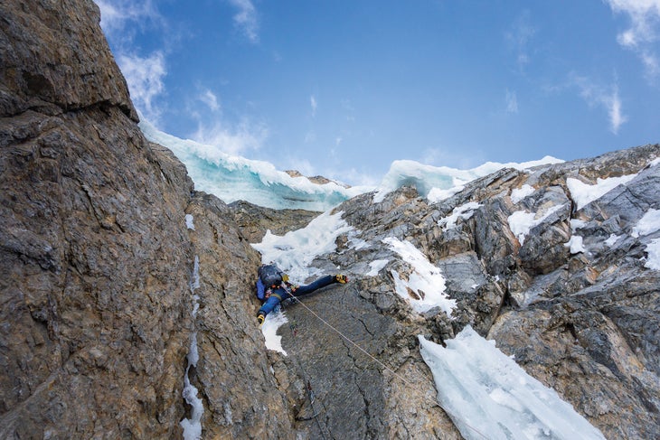 Quentin Roberts navigates the upper portion of Reino Hongo's crux pitch, on the first ascent of Jirishanca's Southeast Ridge.