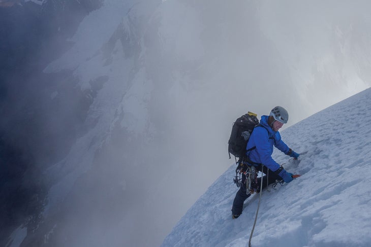 Quentin Roberts climbs steep snow near the summit.