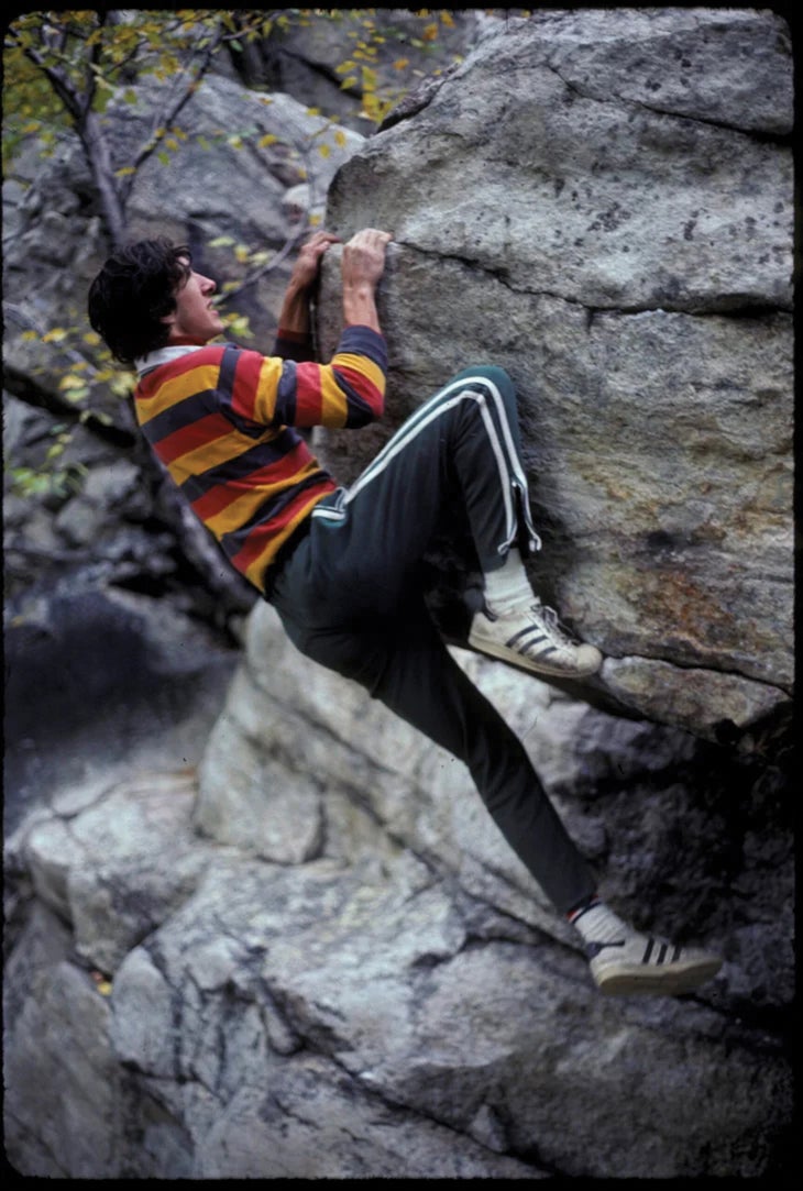 Russ Clune boulders outdoors in New York City.