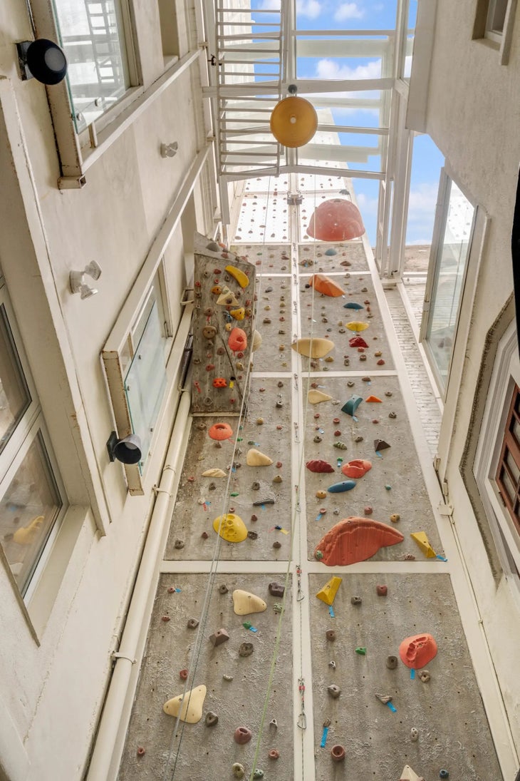 An upward-looking view of the climbing wall at 16 Minetta Lane.