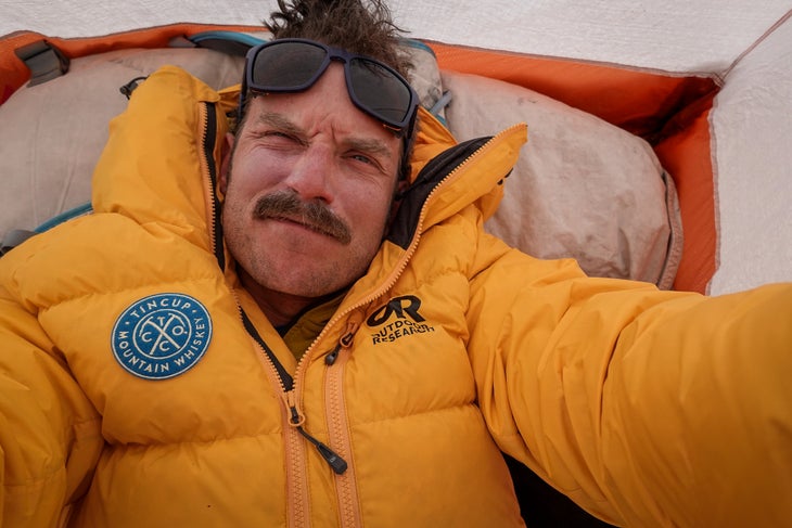 A selfie of Graham Zimmerman in a tent on K2.