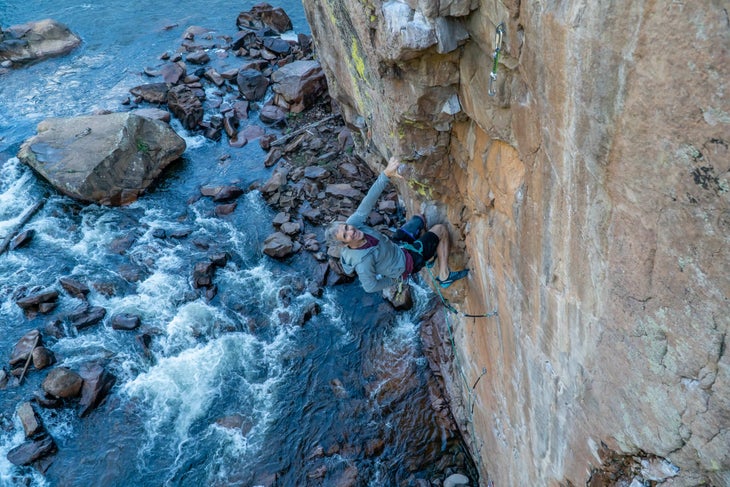 A route developer climbing his new route.