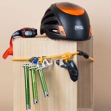 An assortment of climbing gear including ropes, shoes, and helmets, that represent the best climbing guide of 2024.