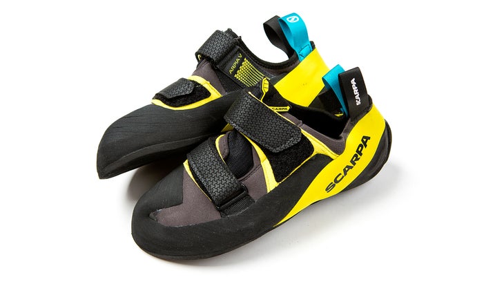 Black and yellow Scarpa Arpia climbing shoe on white background.