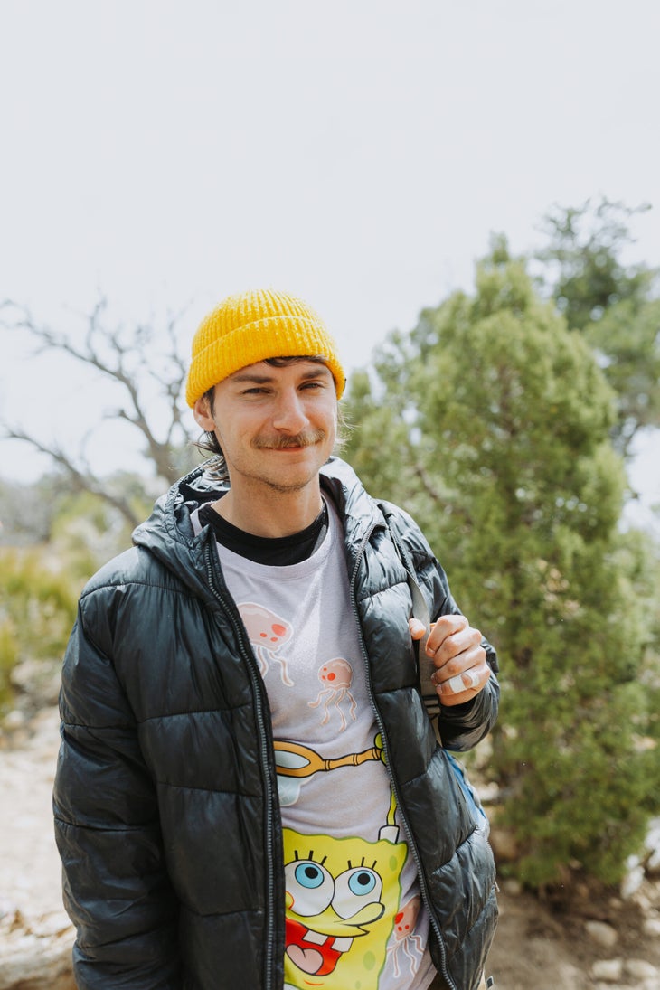 Matt Richard smiling at the crag