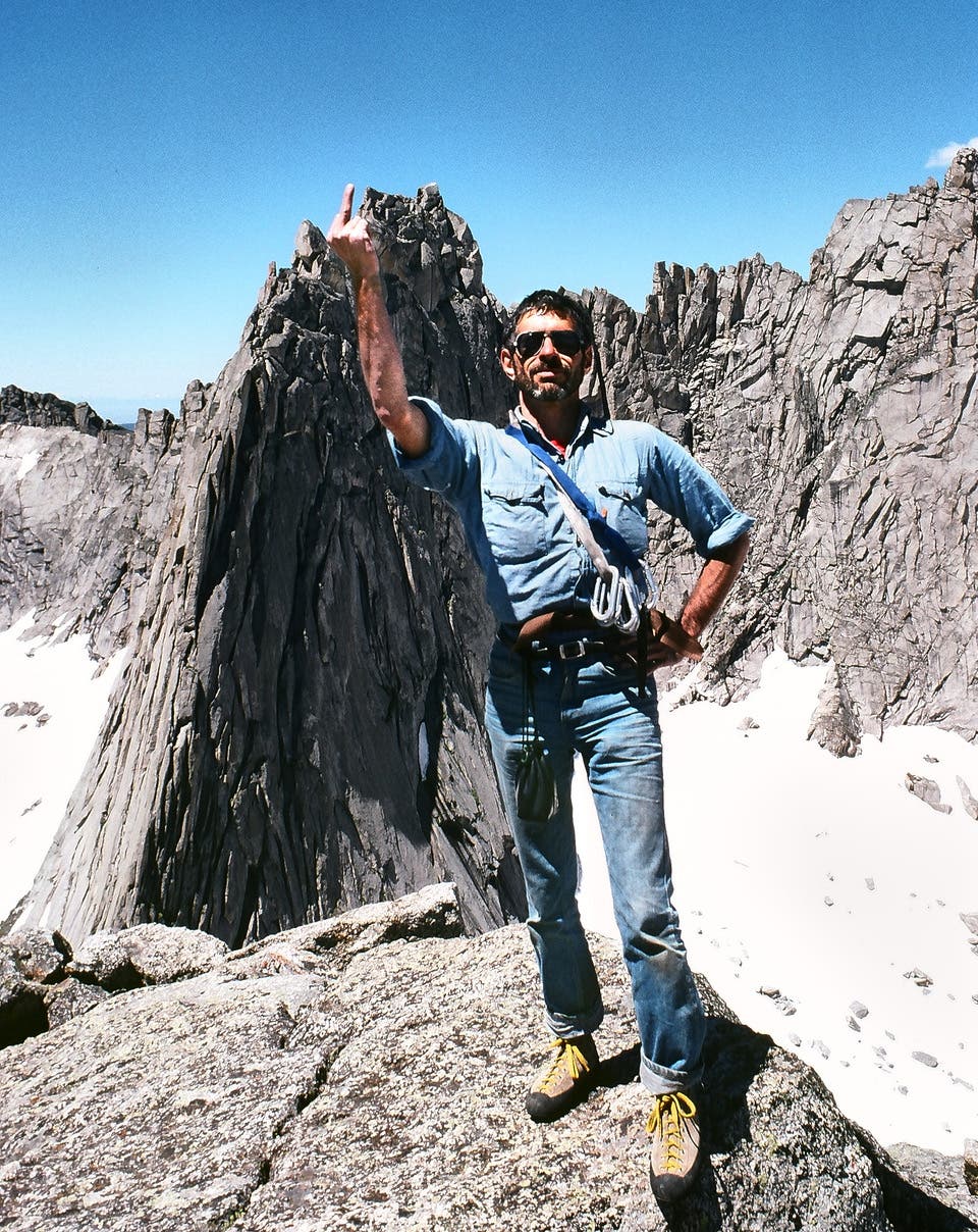 Burt giving the camera the finger from the summit of Pingora Peak in the Wind River Range.