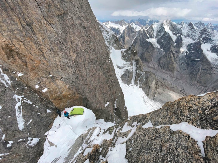 Looking down the first pitch of the north face headwall on White Sapphire to the bivy site in the notch at the top of the couloir. Some aid was used during the first attempt, but all three climbers freed the headwall pitches during the final ascent.