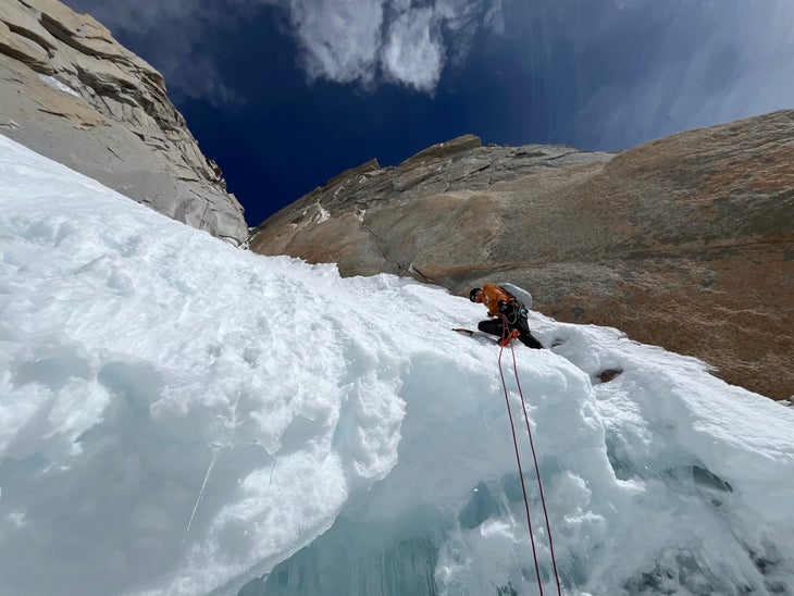 Colin Haley crosses the bergschrund during a day trip up the Amy-Vidailhet couloir (AI 3+ M4; 300m) on Aguja Guillaumet, Patagonia.