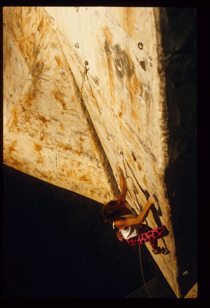 climber competing on a gym climb