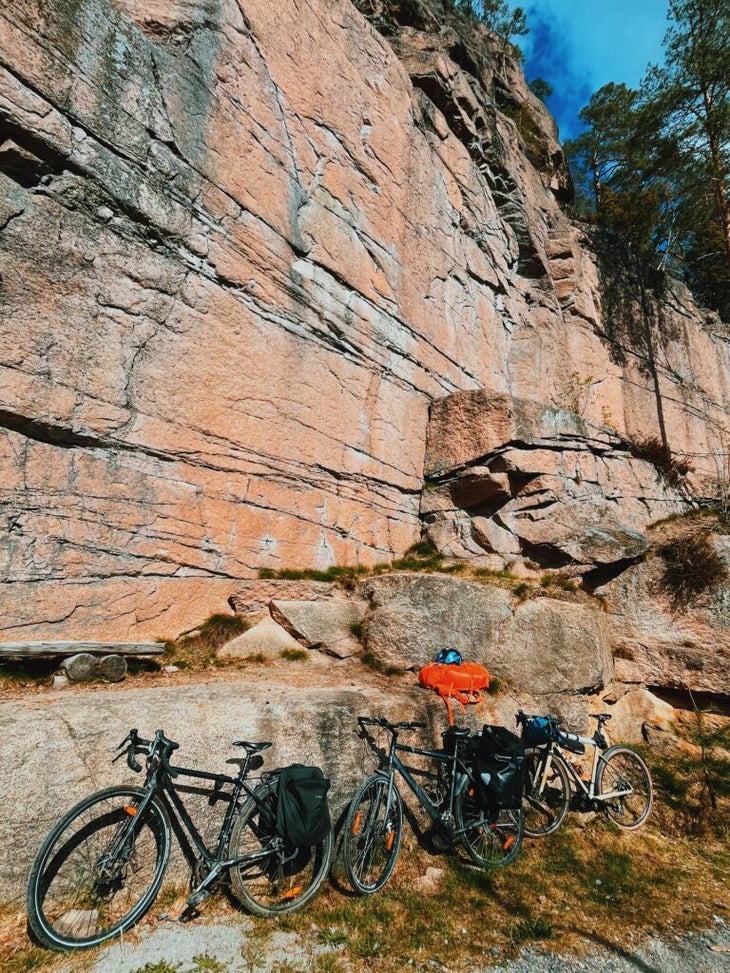 bikes leaning against rock