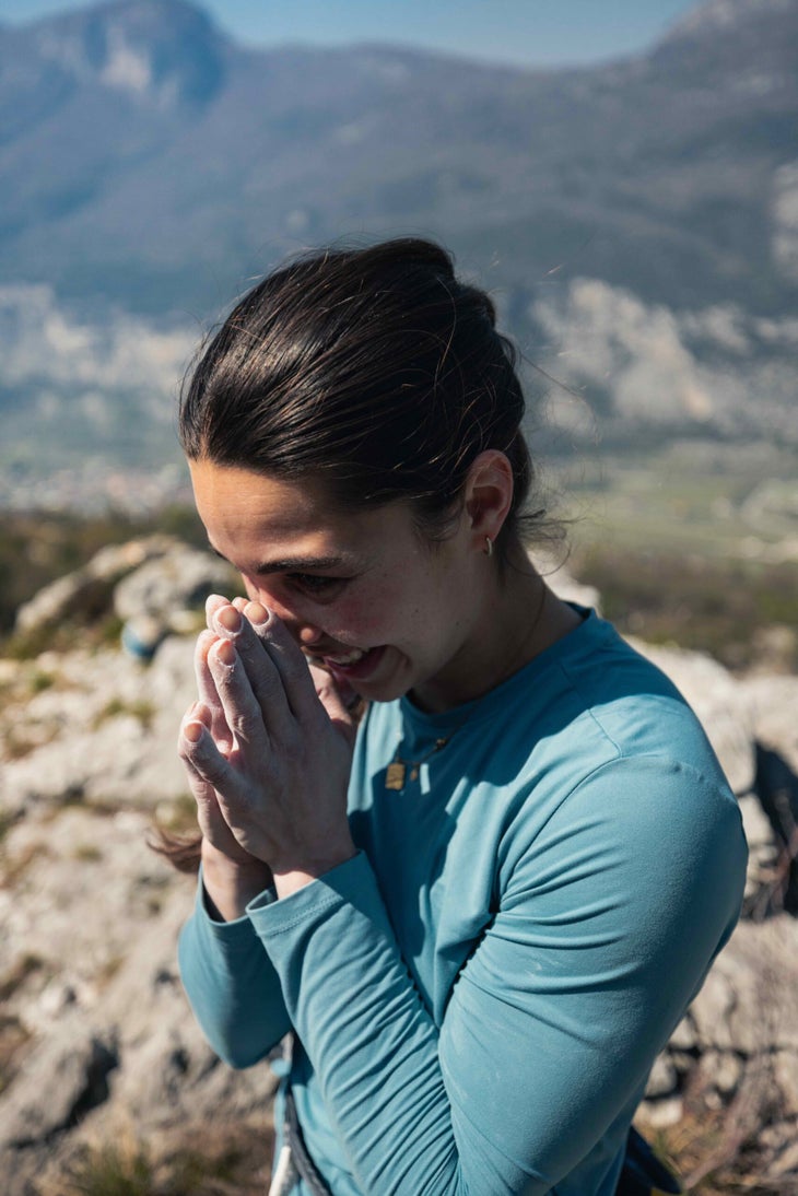 Brooke Raboutou smiles after becoming the first woman to climb 5.15c.