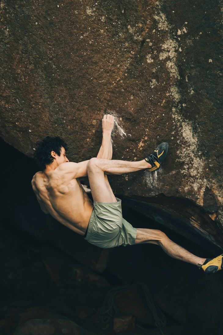 Male climber on one of the world's hardest boulders.
