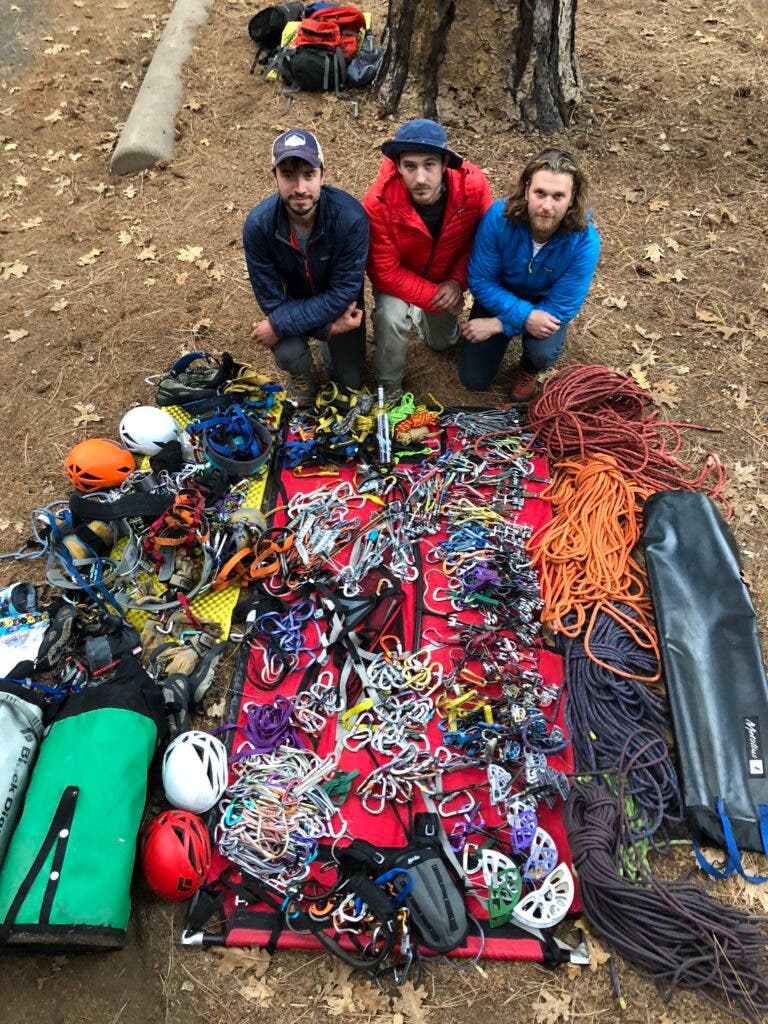 climbers with their haul bags and gear