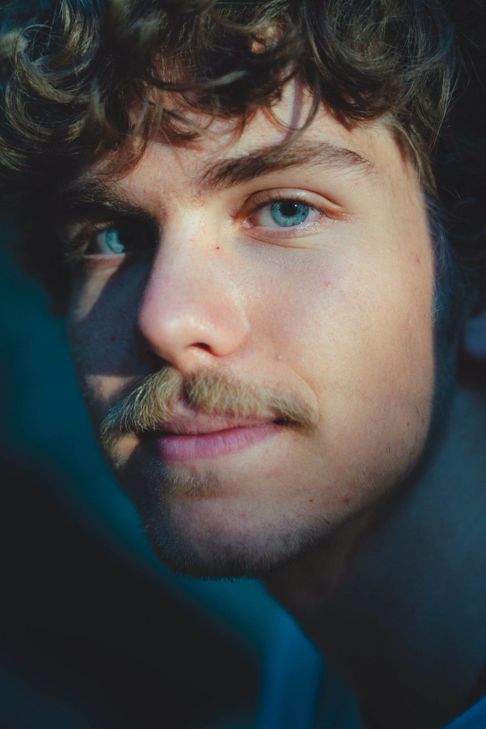 Portrait of Ethan Morf smiling in Squamish.