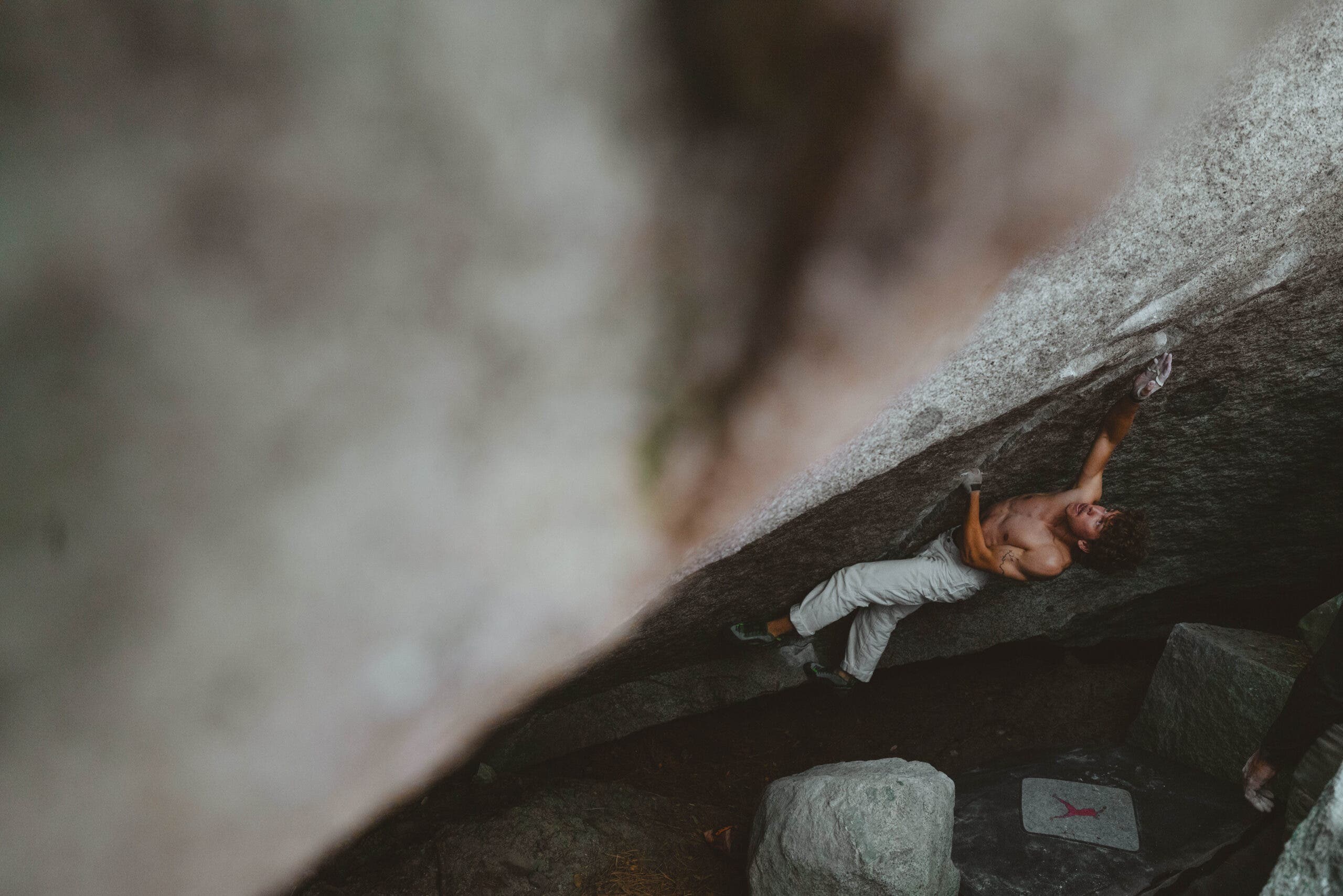 Ethan Morf climbs Bachar Cracker (V4) in Yosemite Valley.