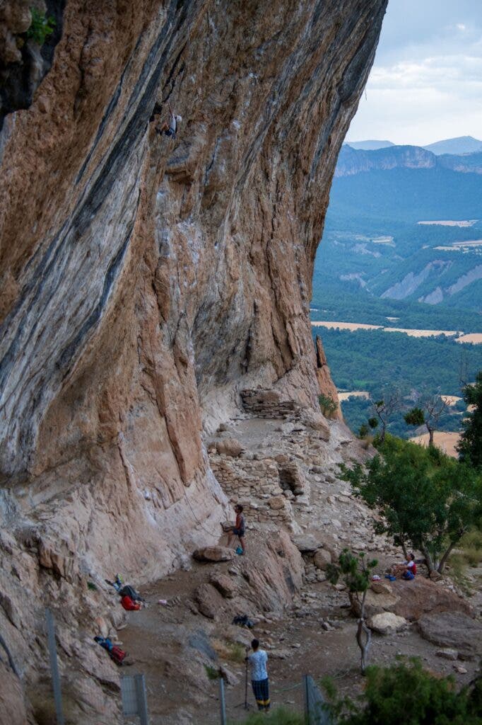 A nine-year-old climbing an overhanging cliff