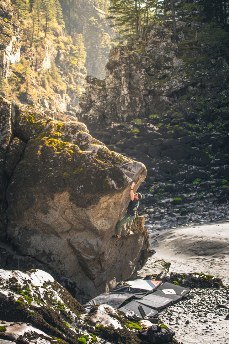 Denis Langlois climbs All Aboard (V4) boulder in the Fraser Canyon.