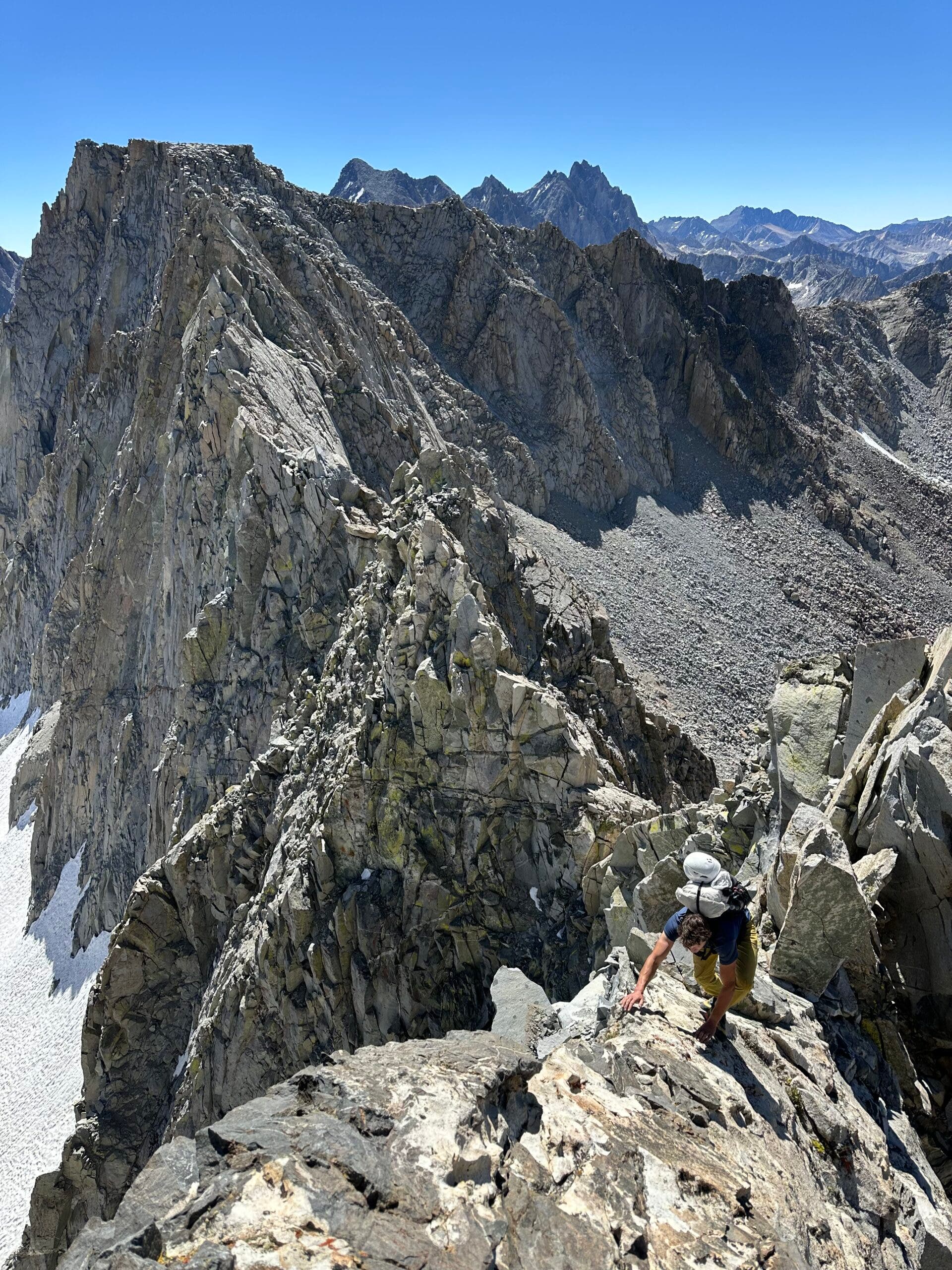 Climbers traverse the Goliath ridgeline in Sierra Mountains.