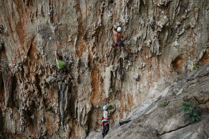 Two climbers climbing a steep wall in Kalymnos 