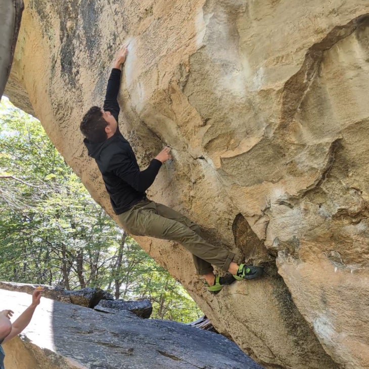 Anthony Walsh working the moves of El Gato Negro (V9) in El Chalten, Patagonia.